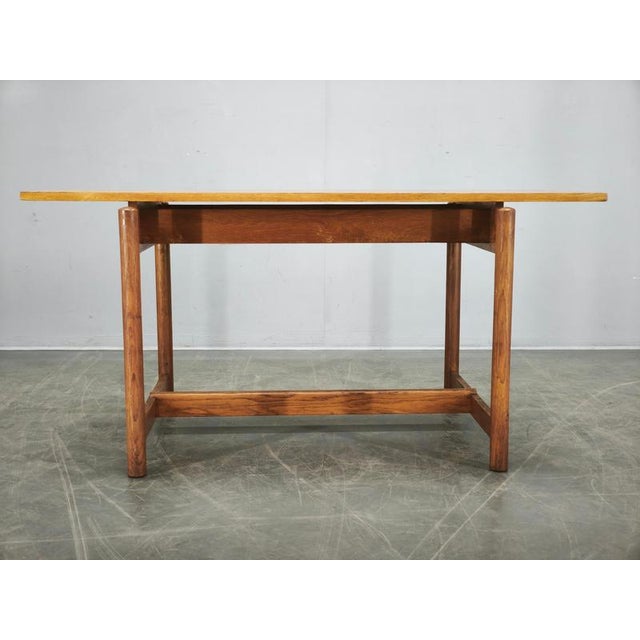 A refined mid-century coffee table produced in Czechoslovakia during the 1960s by Krásná Jizba. Constructed from solid oak...