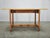 A refined mid-century coffee table produced in Czechoslovakia during the 1960s by Krásná Jizba. Constructed from solid oak...