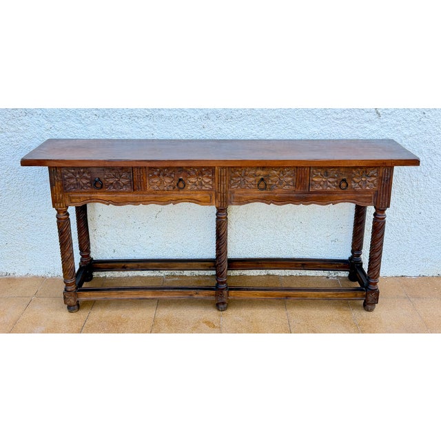 Elegant Spanish console table from the 20th century, crafted in wood and inspired by traditional Baroque designs. The...