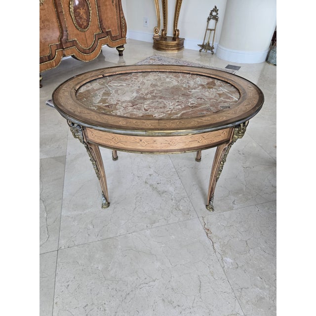 Antique French Bronze & Marble Coffee Table W Rams Heads sold as found with fading to finish and small abberations to wood...