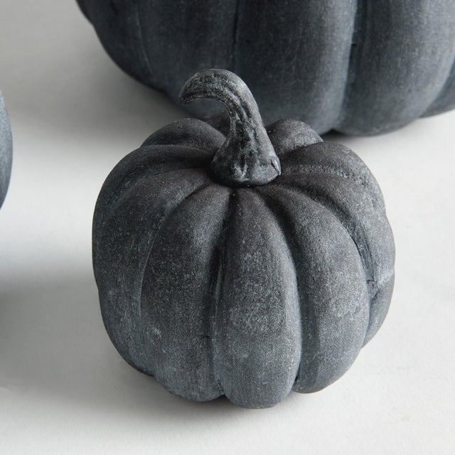 We are leaning into the Autumnal season with our cast aluminum sculpted pumpkins. This set of three adds a festive touch....