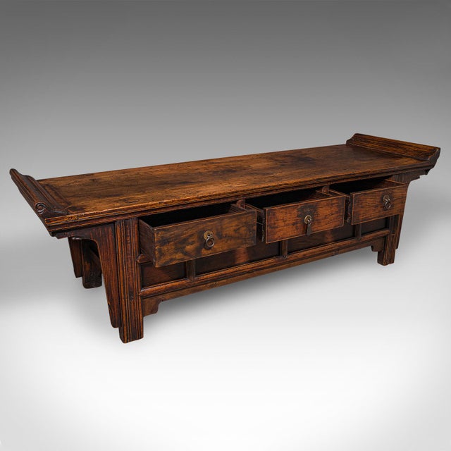 This is a low vintage bay window bench. An Oriental, Asian Elm hallway pew, dating to the Art Deco period, circa 1930. A...