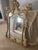 Elevate your space with this magnificent, statement-making Chinese Chippendale style giltwood wall mirror by the historic...