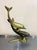 1970s-80s large brass double dolphin statue/sculpture. Some mild patina to metal throughout as shown.