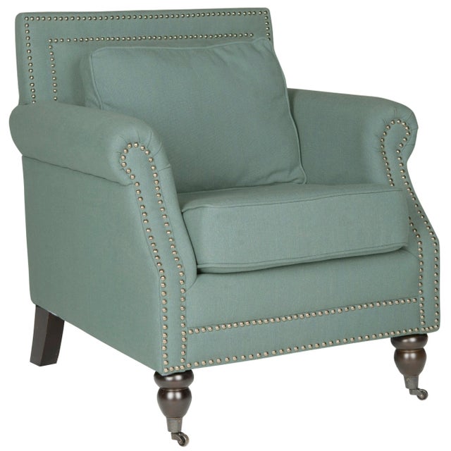 Timeless, and perfect for a casual lifestyle, the classic club chair by is upholstered in a linen and cotton blend in...
