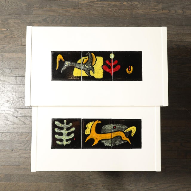 This pair of rectilinear oak side tables were designed by iconic American designer Vladimir Kagan, circa 1950, and exude...