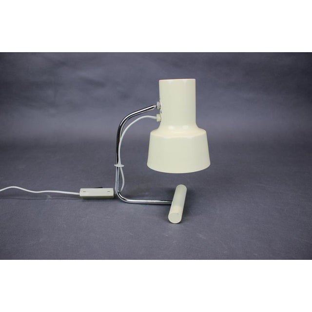 Vintage table lamp designed by Josef Hůrka for Napako and manufactured in Czechoslovakia during the 1960s. The lamp...