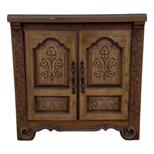 Vintage French Provincial Carved Oak Two-Door Accent Cabinet With Floral Motifs and Iron Hardware For Sale