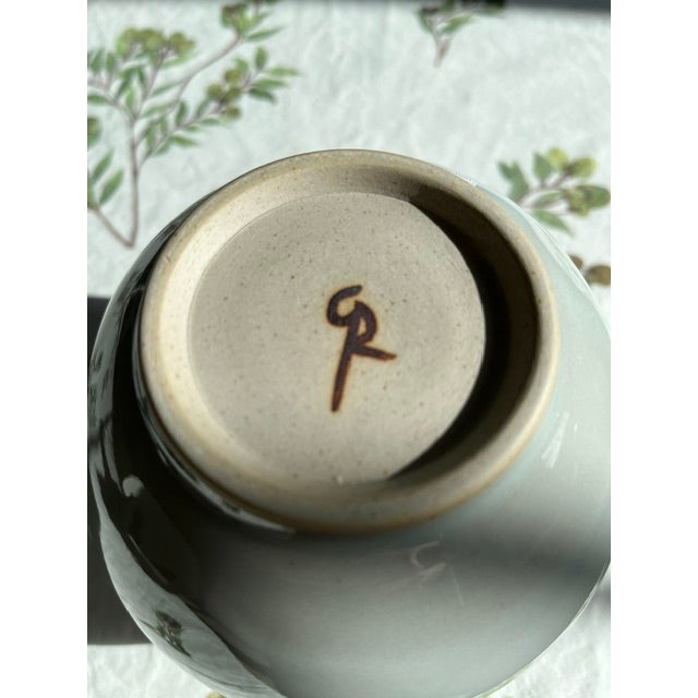 Christiane Perrochon round vase handmade in Italy. The color is referred to as celadon. The vase measures 5.5" tall and...