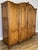 An impressive Vintage French Louis wardrobe , beautifully proportioned with an elegant shaped cornice, decorative carved...