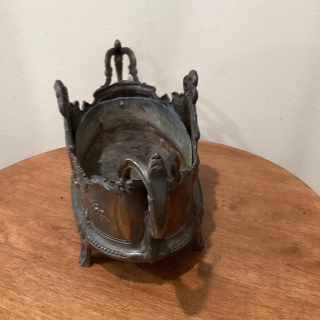 Discover the elegance of Antique French Jardiniere, an exquisite piece that blends the allure of Art Nouveau design with...