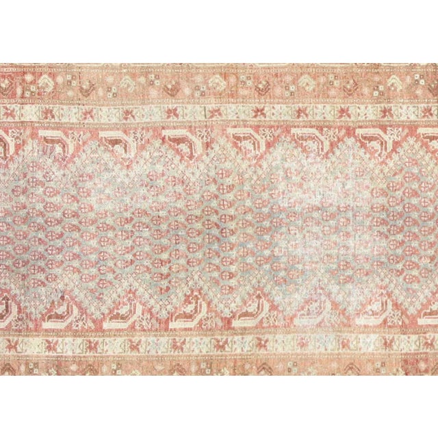 1940s Persian Melayer Rug. Hand woven with wool on cotton foundation in the Hamadan region of Iran. The Persian carpet is...
