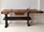 A stunning, fully functional vintage carpenter’s workbench that combines authentic rustic charm with practical utility....