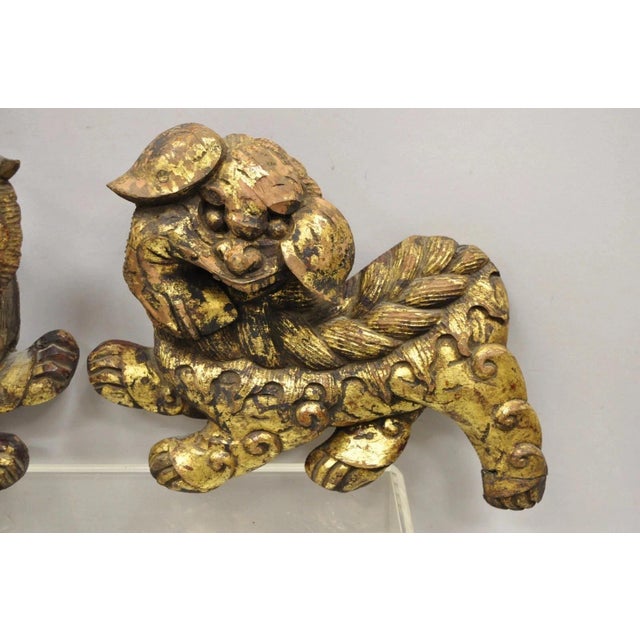 Chinoiserie Vintage Chinoiserie Carved Wood Gold Gilt 12" Chinese Foo Dog Figures - A Pair For Sale - Image 3 of 11