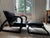 1940s French Black Leather + Wood Lounge Chair with Ottoman Attributed to Francis Jourdain. Reclines to various positions....