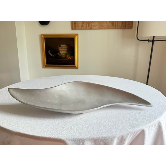 Mid Century Space Age sculptural dish featuring an elongated biomorphic form with sweeping curves, sharply tapered points,...