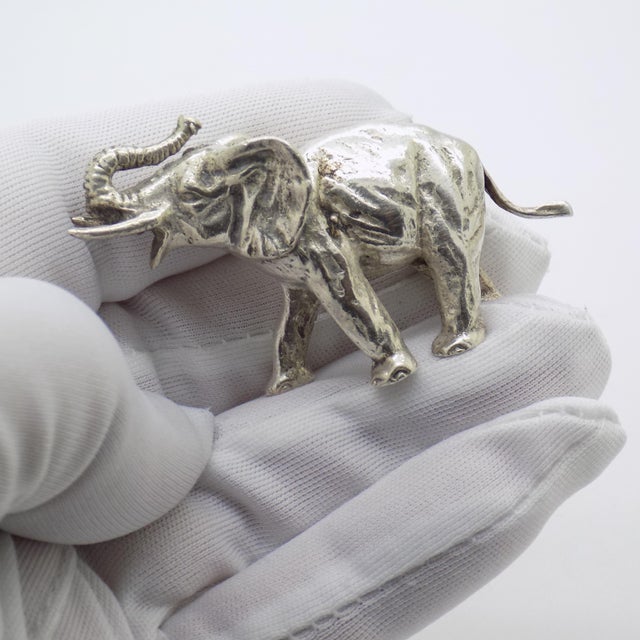A beautifully expressive vintage piece, this Italian handmade elephant figurine captures strength and elegance in a...