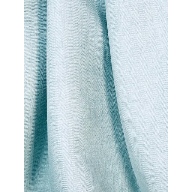 A multipurpose quality in a two-tone light blue and ivory mix. Woven and finished in Europe, the chevron warp stripe is...