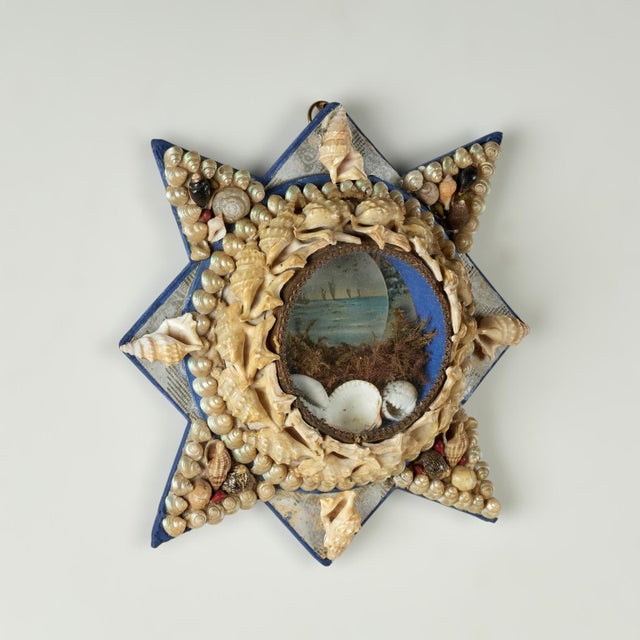 Charming 19th century sailors valentine hand decorated in exotic seashells with an image of sailboats in a bayscape as...