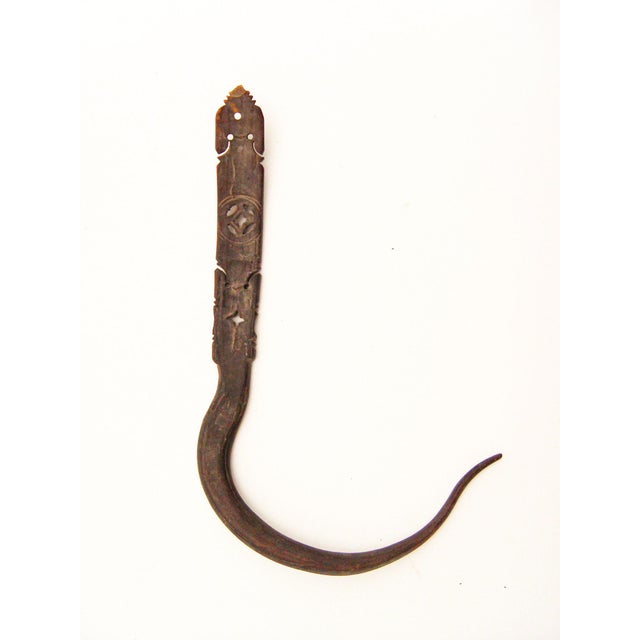 Late 19th century carved and pierced horn hook. Age wear, small surface crack.