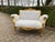 Late 20th Century French Louis XVI–Style Settee Off-White Velvet Upholstery with Gilt Beechwood Frame This elegant single...