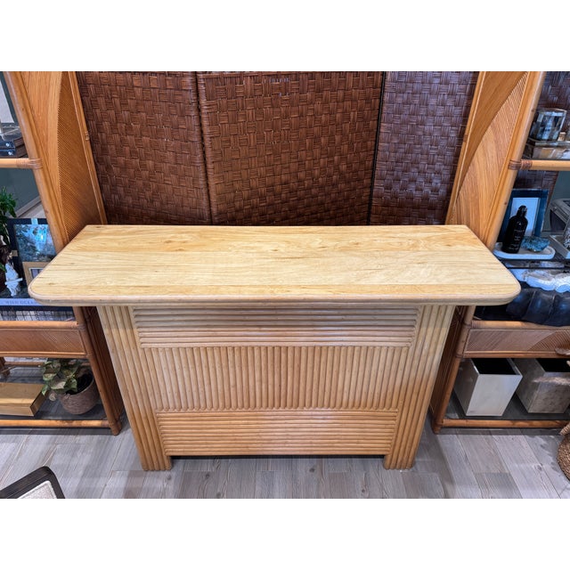 Vintage sanding bar/dry bar from the 70s. Counter-style rattan piece with distinct curved edges and linear architectural...