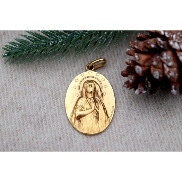 19.2k Gold Our Lady of the Immaculate Conception Pendant, in Worn conditions. Designed 1920 to 1949