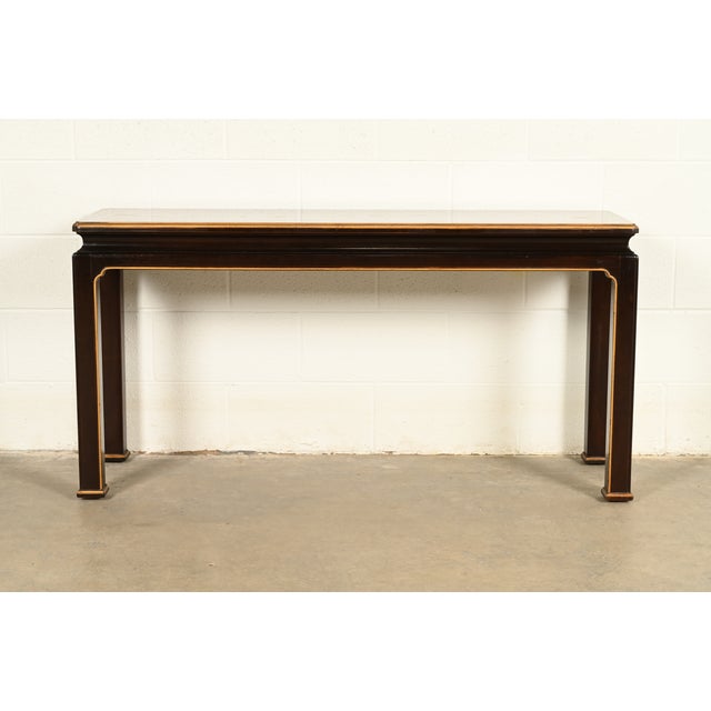A gorgeous Hollywood Regency Chinoiserie style entry table, console table, or sofa table By Henredon USA, Circa 1980s Rich...