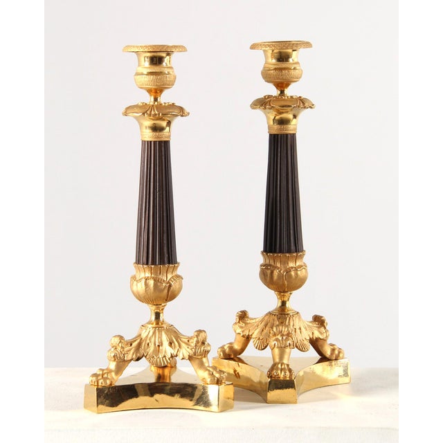 Pair of antique candlesticks, gilded and patinated france bronze charles x acirca 1840 dimensions: h x w x d: 28 x 12 x 12...