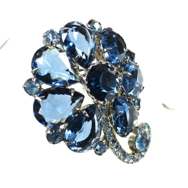 Vintage silver-plated pear-cut sapphire crystal brooch, 1950s. Stylized stem and blossom design , slightly domed,...