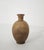 Ceramic vase by artist Zaccagnini. It stands out for its rich sculptural silhouette and distinctive honeycomb-like...