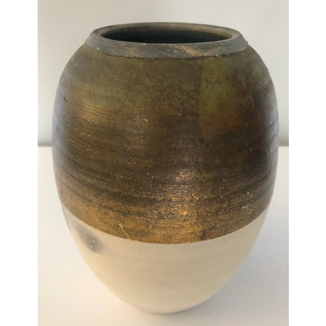Stunning two-tone vase by Sedona artist Michael Weinberg. Metallic Gold/cream/black with teal color inside. Evocative of...