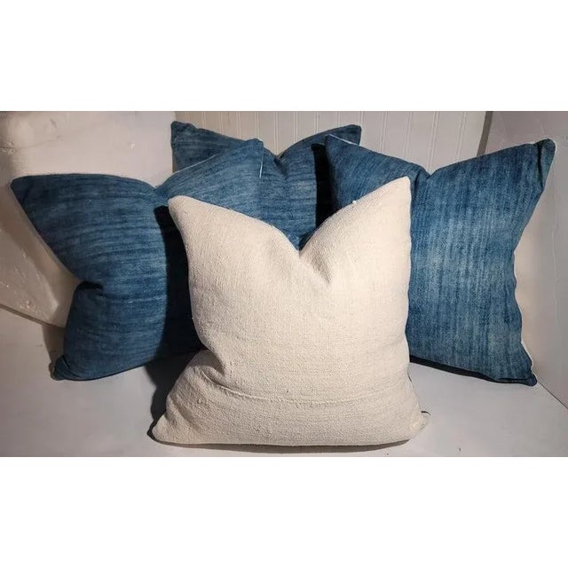 Collection of four 19thc homespun linen pillows with vintage blue linen face and natural white homespun linen...