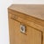An elegant pair of corner cabinets crafted from ash wood with a warm, distinctive grain, featuring the solid, clean lines...