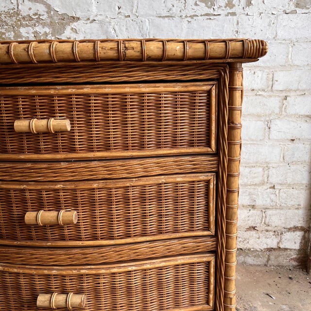 Vintage Wicker Serpentine Chest of drawers The chest has 3 drawers with bamboo handles. Wicker covers the top, front and...