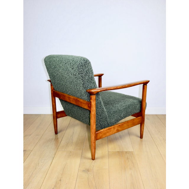 - A vintage easy chair - model GFM-142 - Designed by Edmund Homa - from the 1970s - Reupholstered in rich boucle fabric in...
