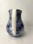 A ceramic pitcher featuring hand painted indigo watercolor brushstrokes. Made in Colombia (South America) by Ceramicas...