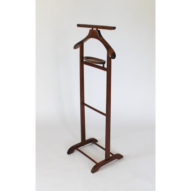 Italian valet, marked "S.P.Q.R." Valet includes slacks and suit jacket hanger, two pull-out tie rods and change tray. Some...