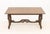 Rococo Style Walnut Extending Trestle Table, the flip-top with carved fan and floral bands above carved foliate cabriole...