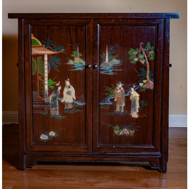 The 1940's Chinese Bar J.L. George Hong Kong is a vintage original piece made of wood in brown color. This antique item...