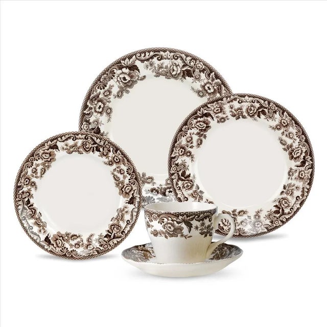 The beautiful flower and scroll design of Spode's Delamere pattern features the historic British Flowers border in a...