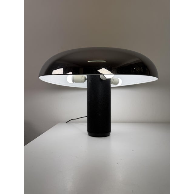 Space-Age Lumenform "Circa" table lamp, 1970 Featuring a large, mushroom-shaped chrome lampshade (internally enameled in...