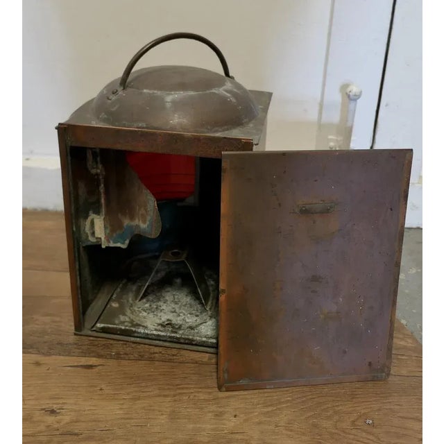 Well Weathered Ships Copper Navigation Light. The lamp is flat sided with original bowed and ridged glass front, this has...