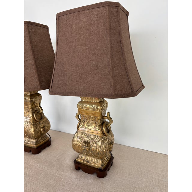 Brass Vintage Pair Asian Archaic Brass Urn Lamps James Mont Style With Linen Shades For Sale - Image 8 of 15