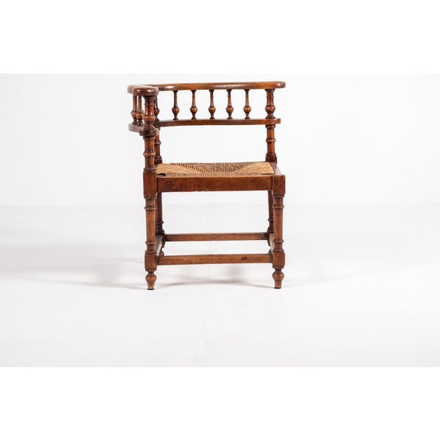 Beautiful antique walnut corner chair, featuring a beautifully crafted spindle backrest. The chair brings charm and warmth...