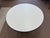 1960’s Mid Century Modern Herman Miller Eames Aluminum Group coffee table. The table features a white laminate top with a...