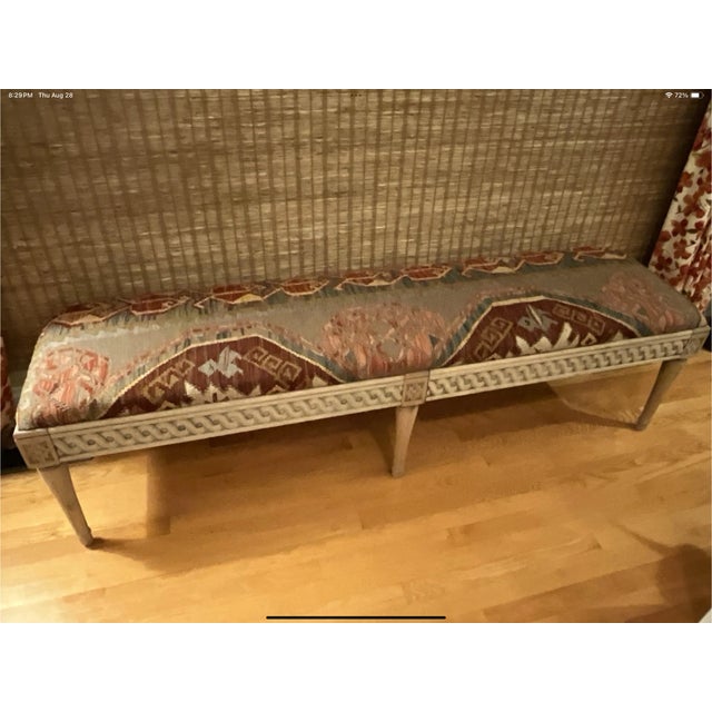 Crafted from hand-woven kilim. Textured bench brings a rich touch to every setting. Hand carved, hand finished, hard wood...