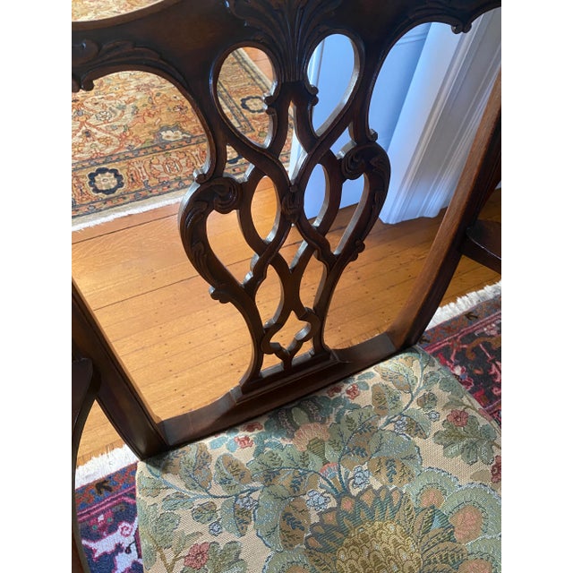 Stunning set of Georgian Chippendale style dining chairs with traditional carving with a pierced & carved center....