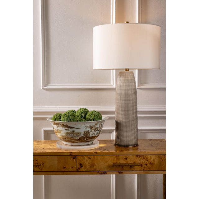 Name: Cannon Brown Lamp Size: 31"H x 17"dia Transitional in shape, the Cannon lamp is available in multiple translucent...