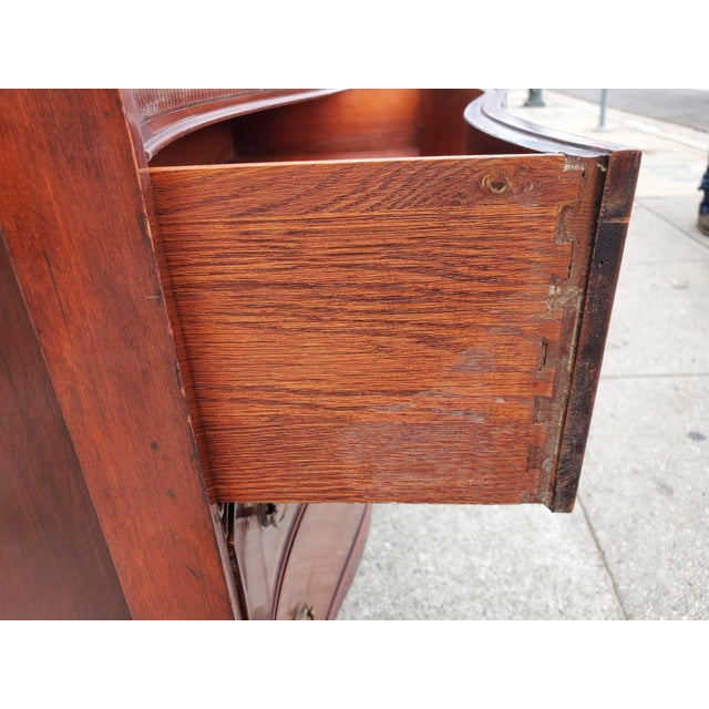 Nice, vintage early 1940s mahogany dresser in a Federal style. All original hardware and nice deep drawers. The inside of...
